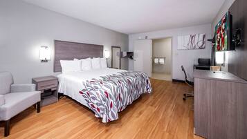 Desk, laptop workspace, blackout drapes, iron/ironing board