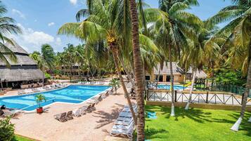 Outdoor pool, pool umbrellas, sun loungers