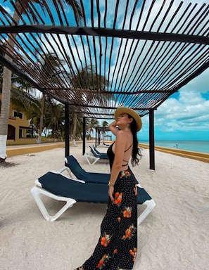 Private beach, white sand, sun loungers, beach umbrellas