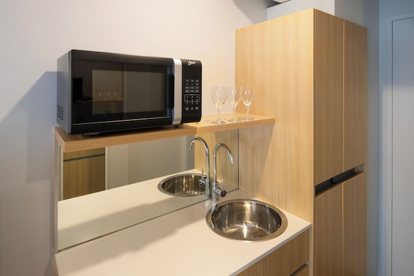 Mini-fridge, microwave, coffee/tea maker, electric kettle