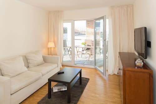 Suite 501 | Wohnzimmer | Flachbildfernseher, Fußbodenheizung