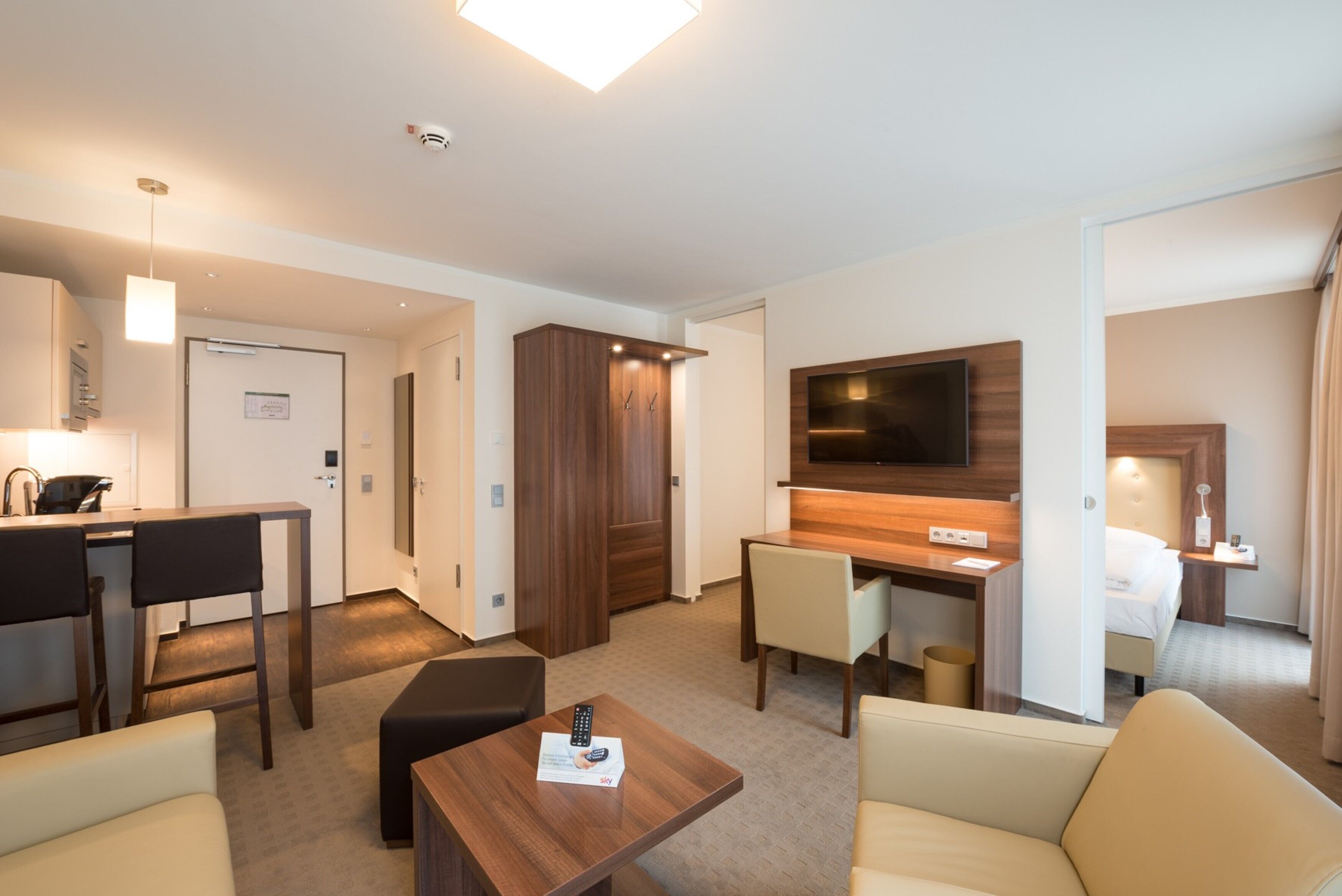 Premium Apartment | Living room | Flat-screen TV, pay films