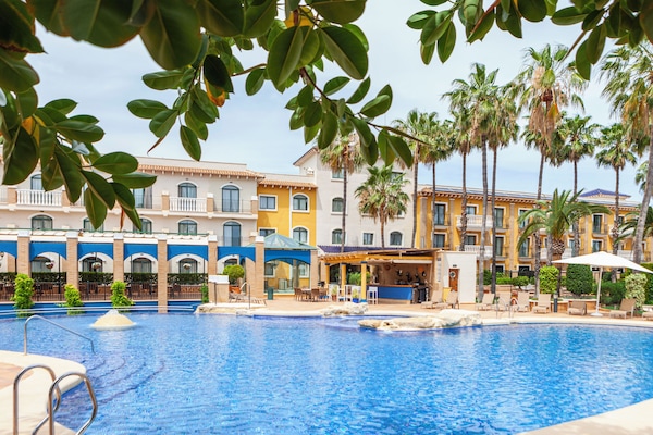 Seasonal outdoor pool, open 11:00 AM to 7:00 PM, pool loungers