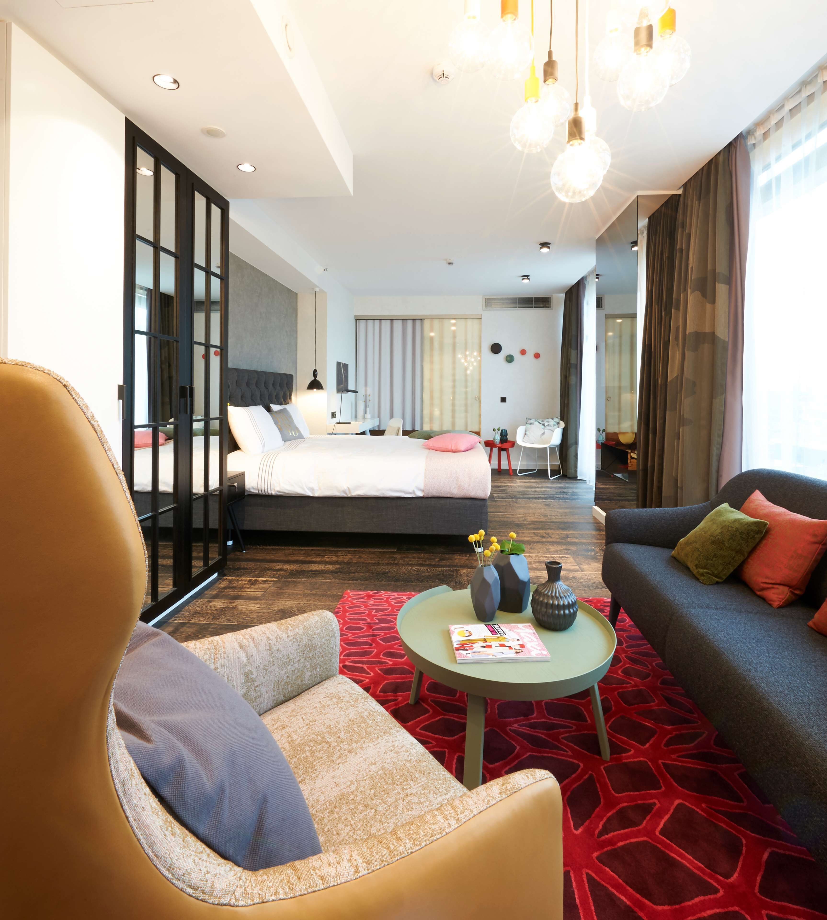 Suite, 1 Bedroom, Balcony (Urban) | Hypo-allergenic bedding, in-room safe, desk, laptop workspace