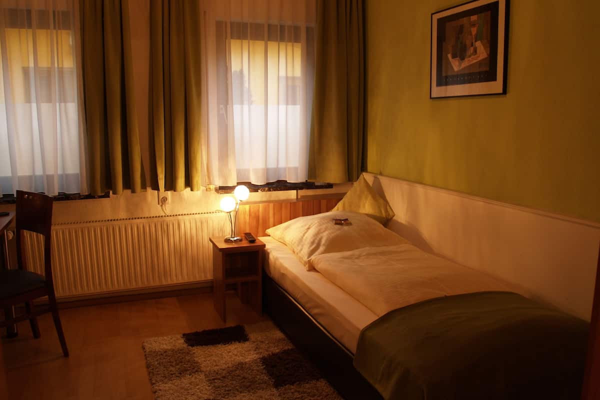 basic single room, 1 single bed, private bathroom | premium bedding, select comfort beds, individually decorated, desk