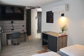 Suite de diseño | Ropa de cama de alta calidad, colchones con acolchado adicional, minibar