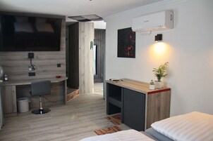 Suíte design | Roupas de cama premium, camas com colchões pillow-top, frigobar