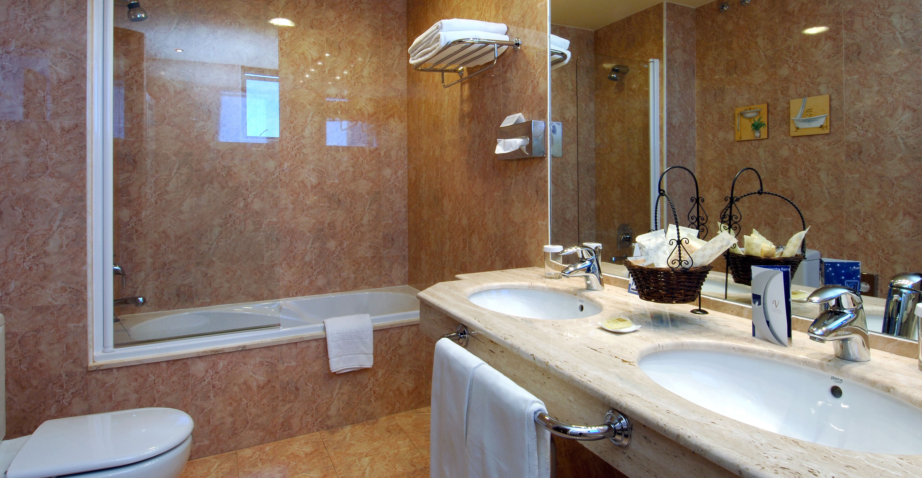 deep-soaking bathtub, free toiletries, hair dryer, towels