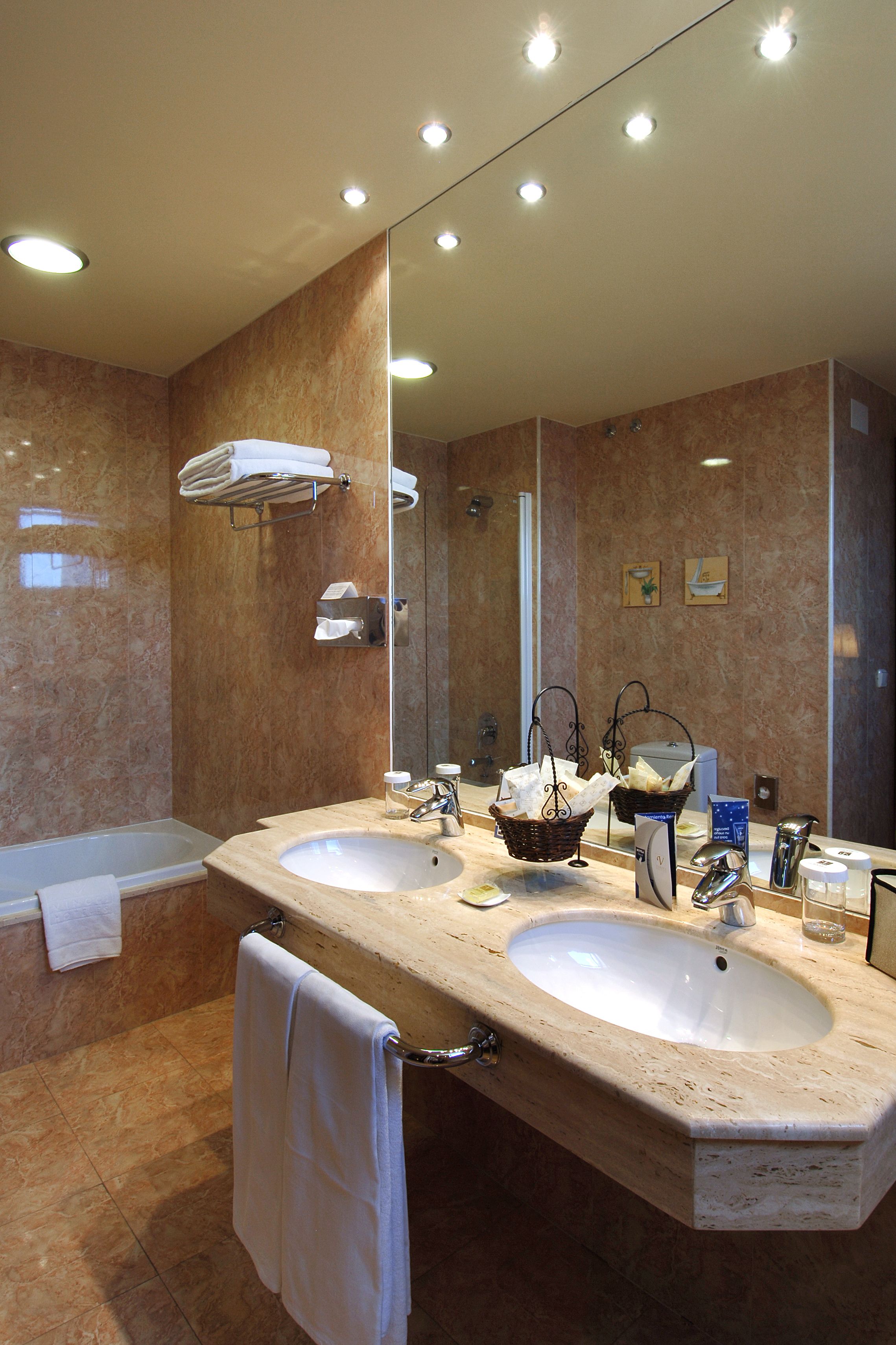 deep-soaking bathtub, free toiletries, hair dryer, towels