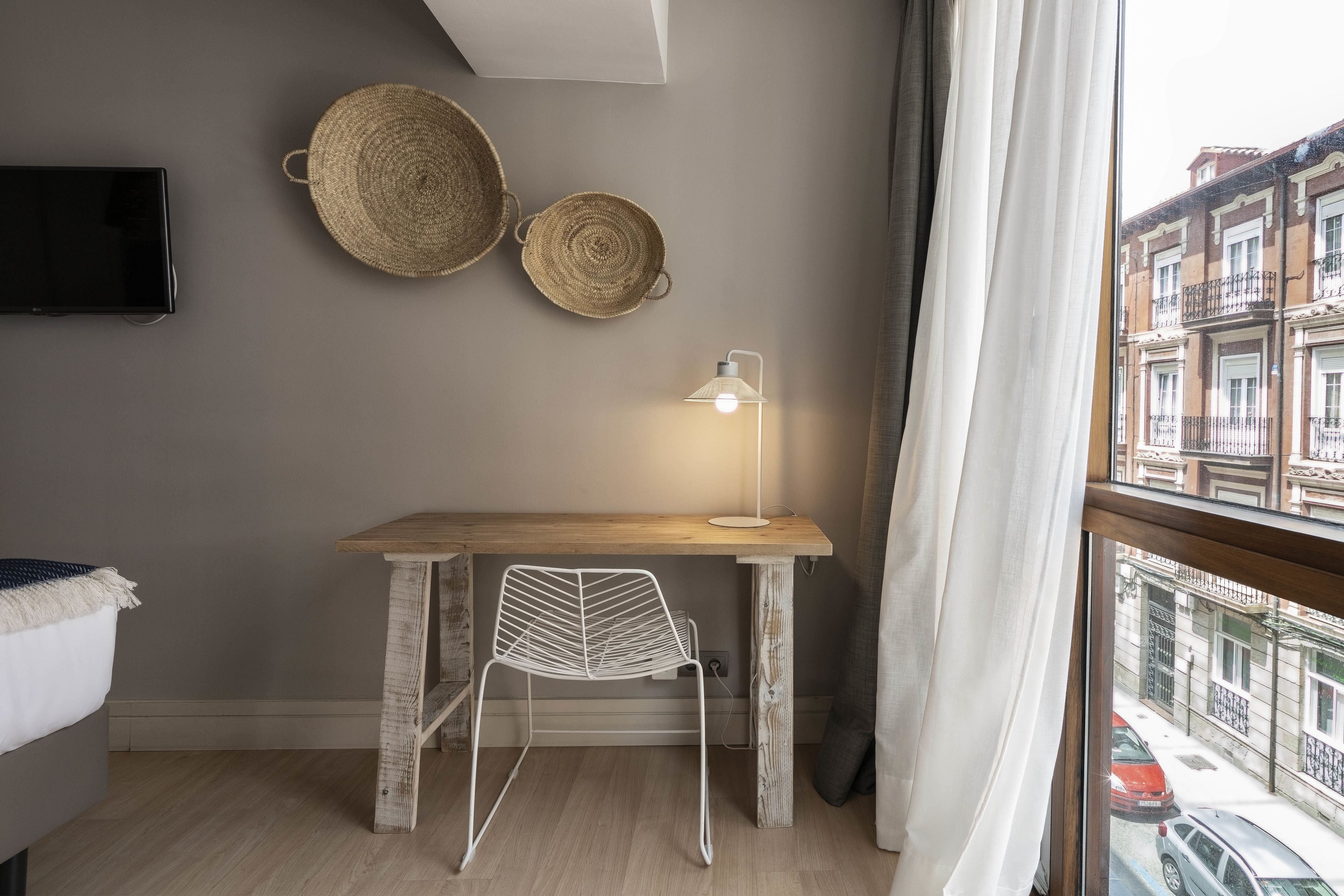 premium bedding, down duvets, minibar, in-room safe