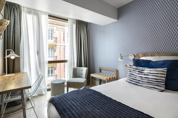 Premium bedding, down duvets, minibar, in-room safe