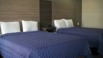 Standard Double Room, 2 Queen Beds | Desk, iron/ironing board, free WiFi, bed sheets