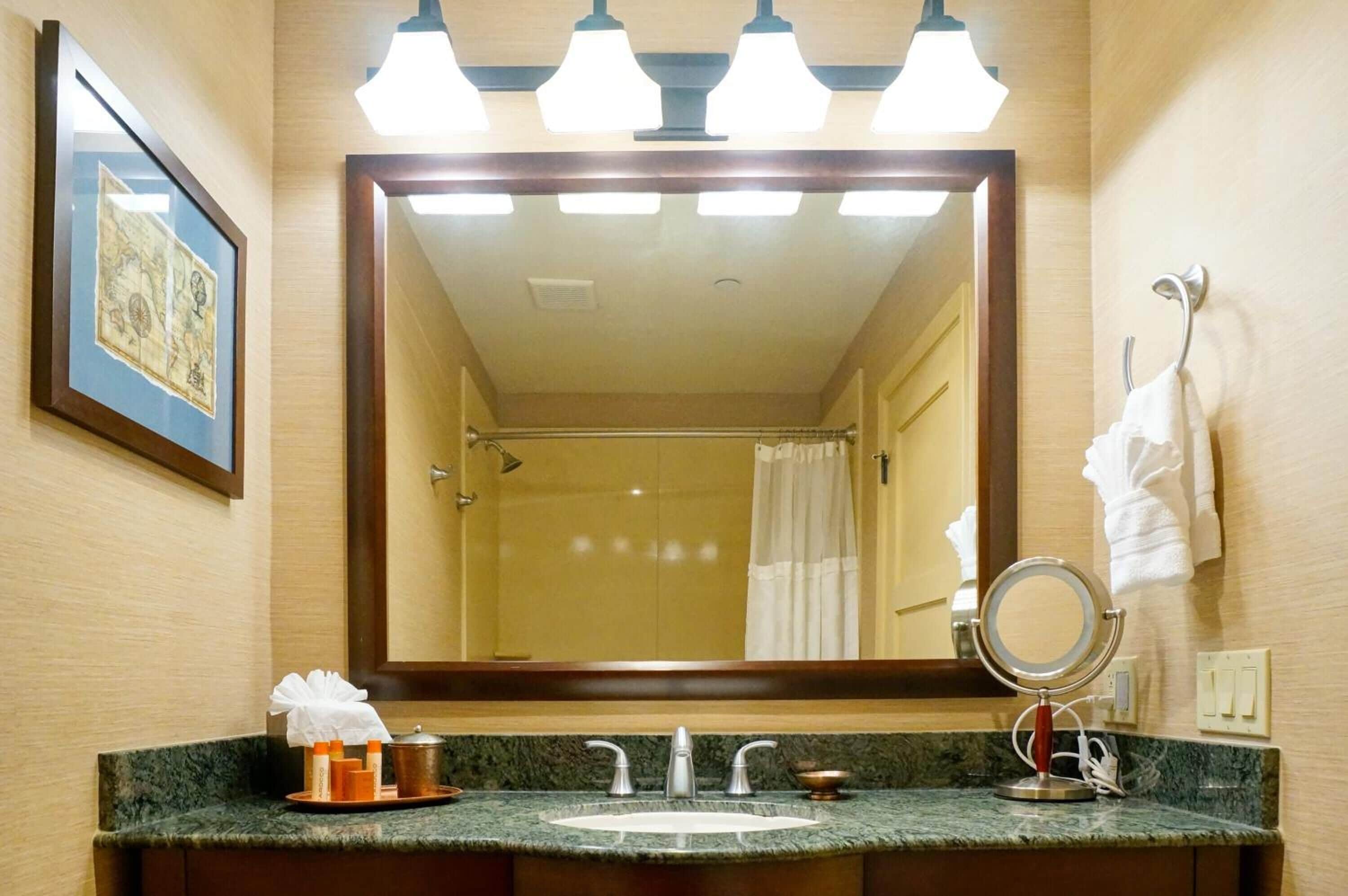 designer toiletries, hair dryer, bathrobes, towels