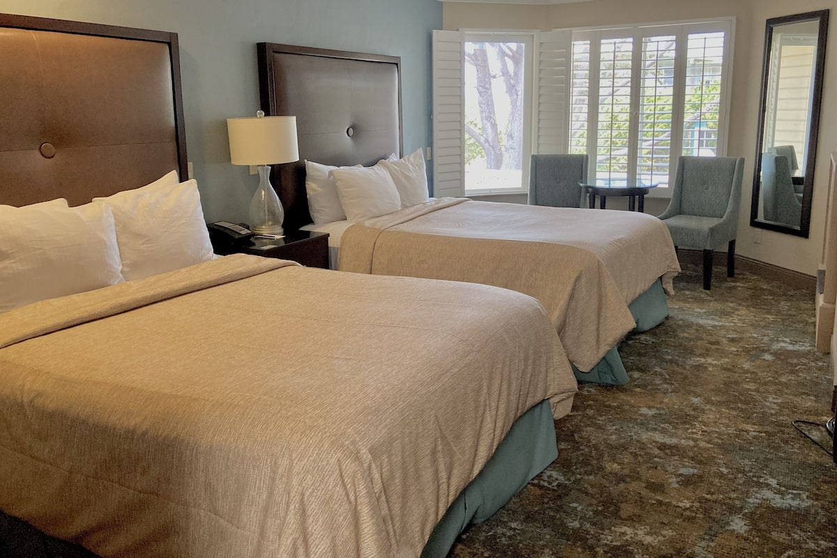 Premium bedding, pillowtop beds, desk, laptop workspace