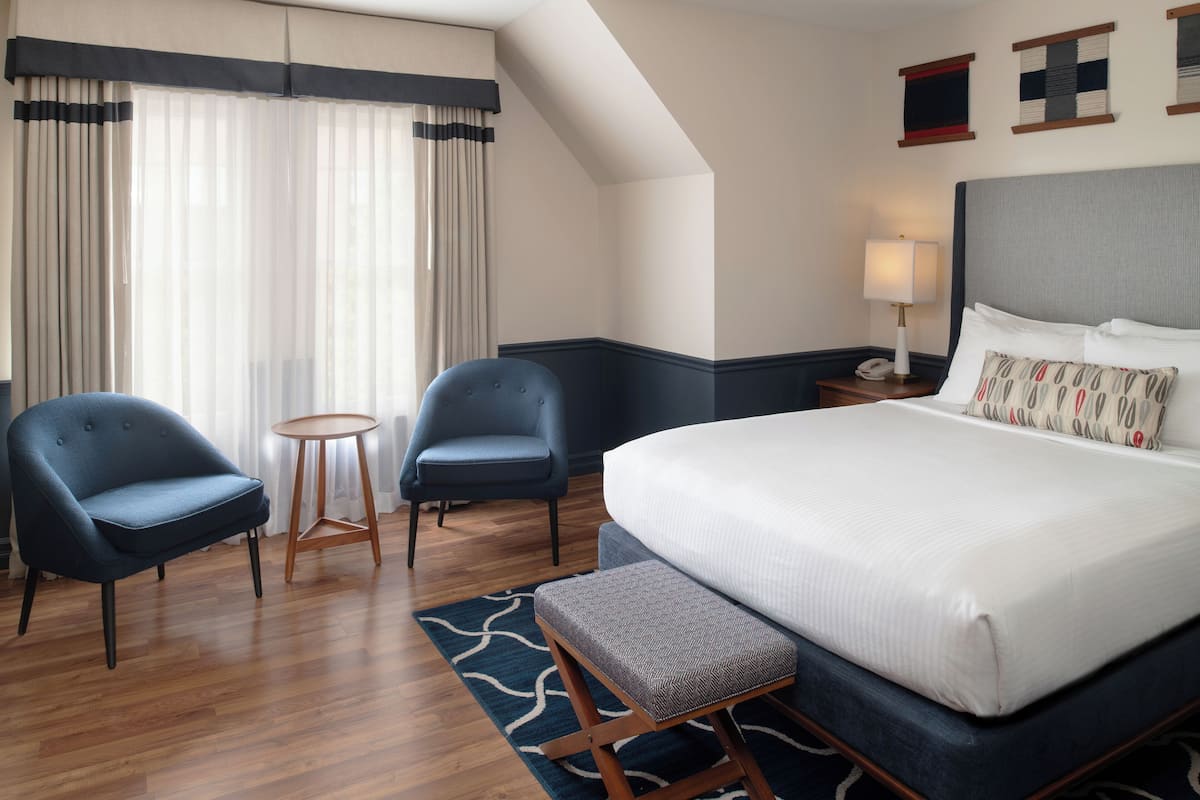 Run of House Room | Premium bedding, desk, blackout drapes, iron/ironing board