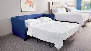 Suite, 2 Queen Beds | Blackout drapes, iron/ironing board, free cribs/infant beds
