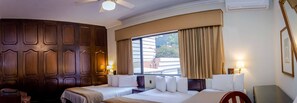 Standard Room, Multiple Beds, Smoking | In-room safe, desk, iron/ironing board, free WiFi