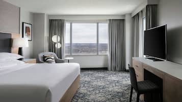 Room, 1 King Bed | Pillowtop beds, in-room safe, desk, iron/ironing board