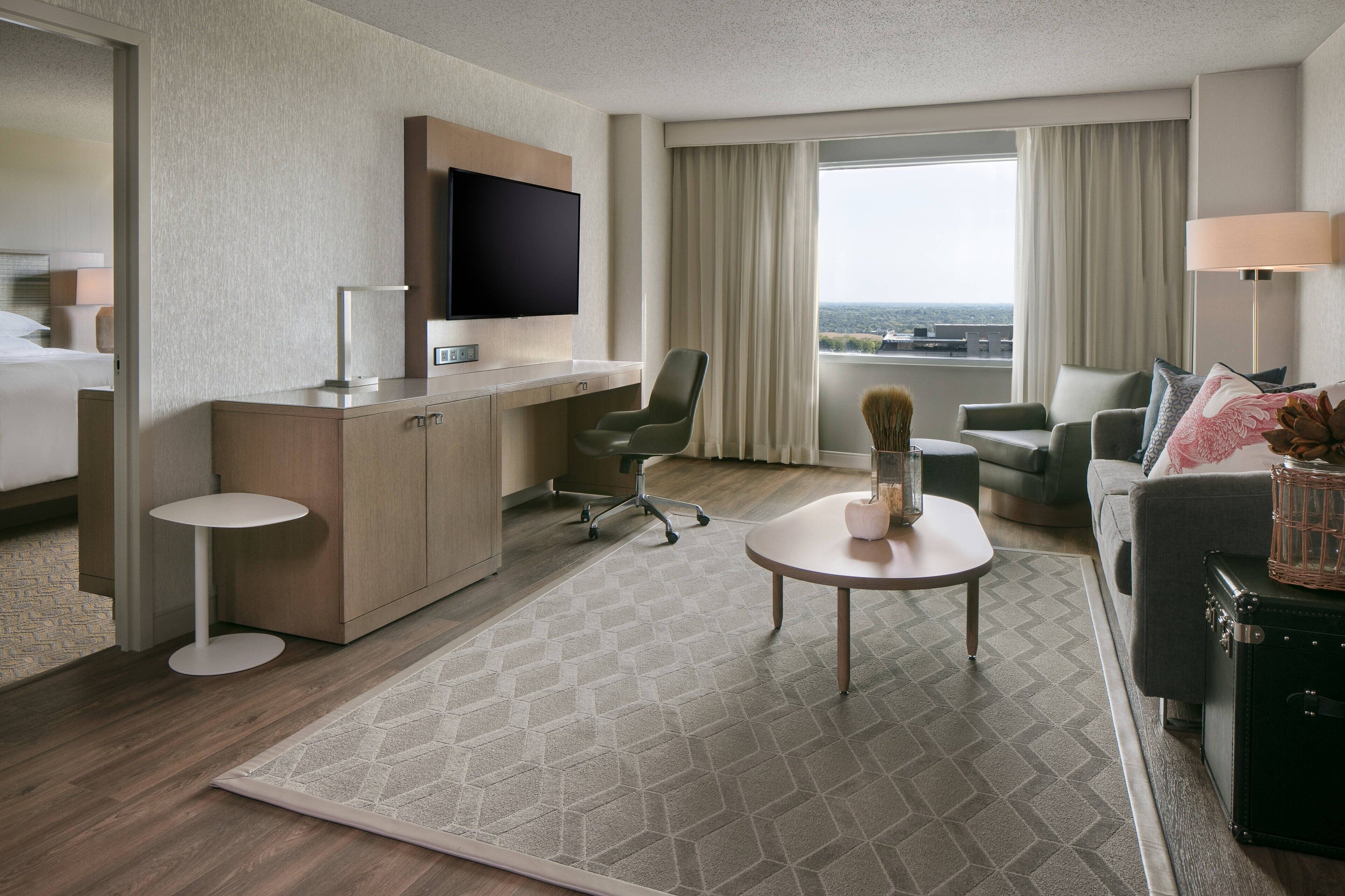 junior suite, 1 king bed with sofa bed, non smoking | living area | 32-inch flat-screen tv with cable channels, tv, pay films