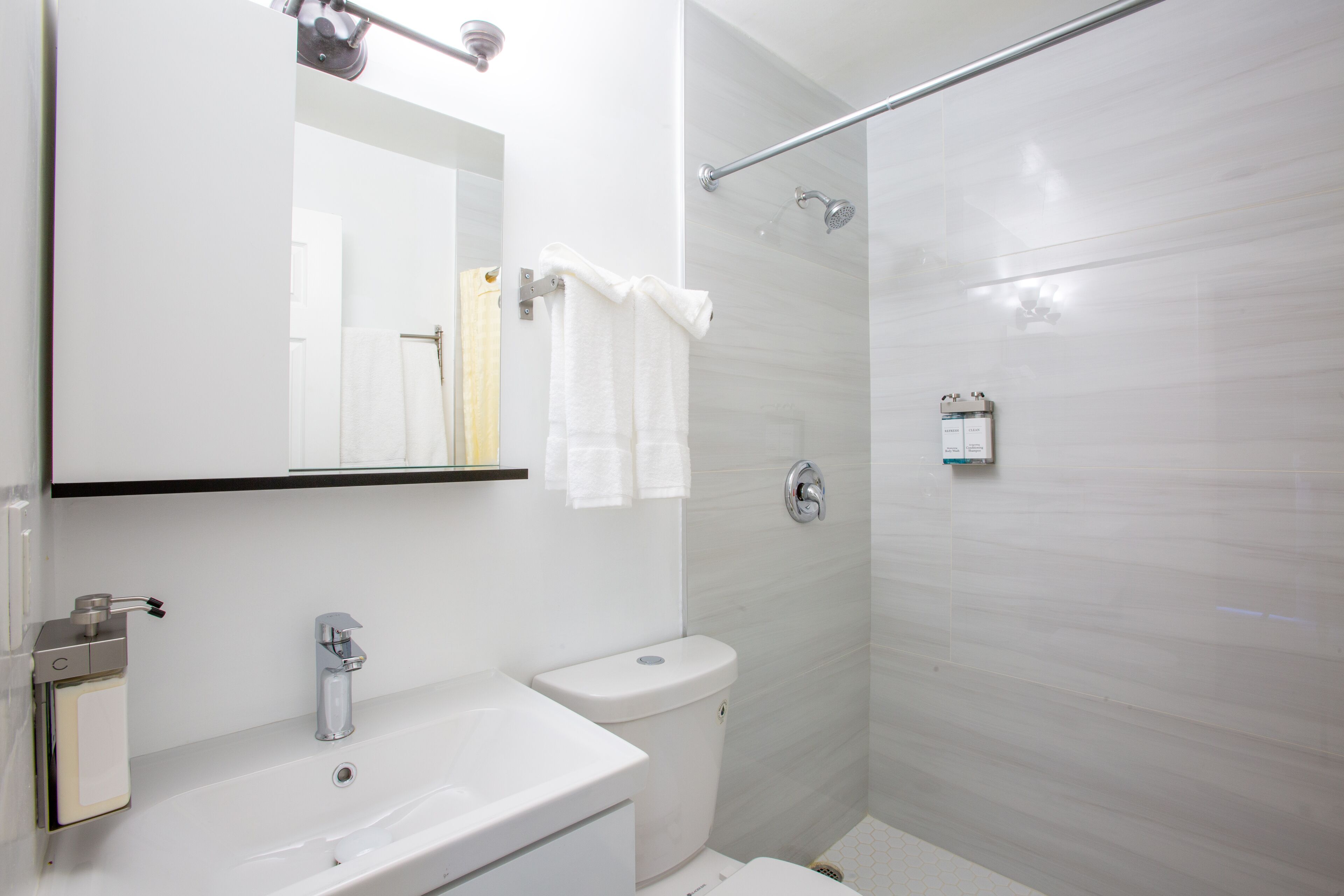 Room, 2 Queen Beds, Non Smoking, Refrigerator & Microwave | Bathroom | Shower, free toiletries, hair dryer, towels