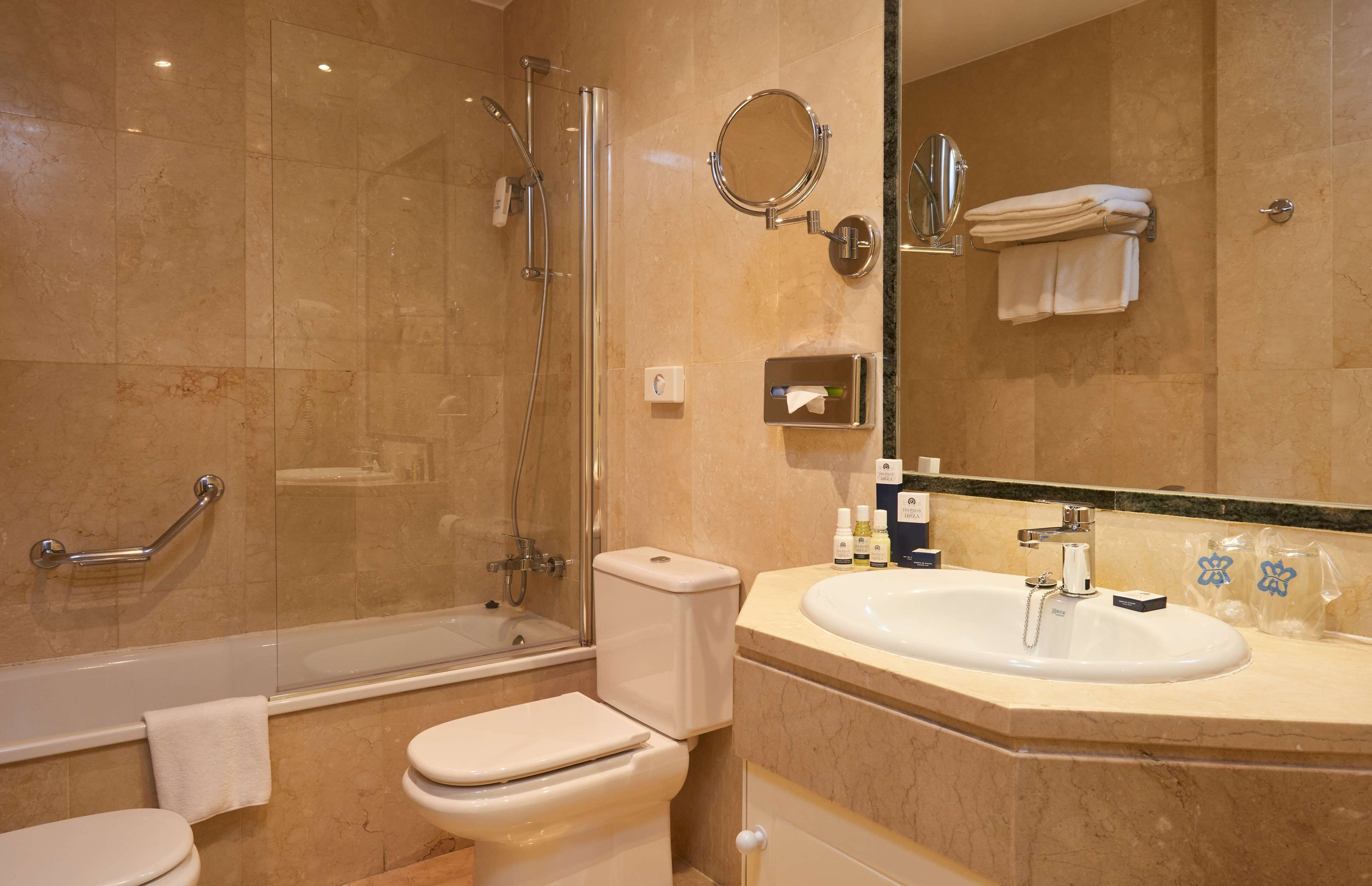 free toiletries, hair dryer, bidet, towels