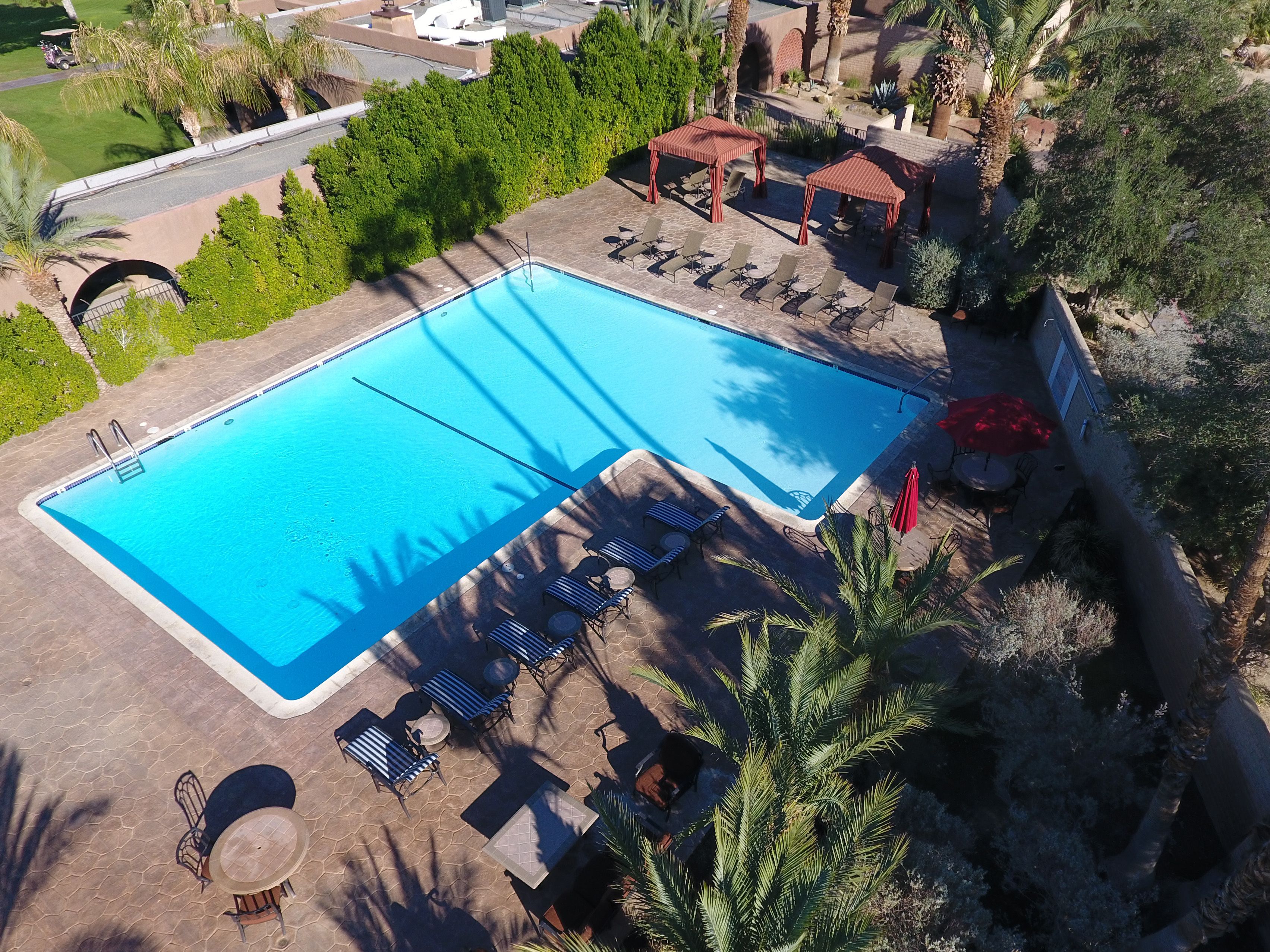 2 outdoor pools, a heated pool, free pool cabanas, pool loungers