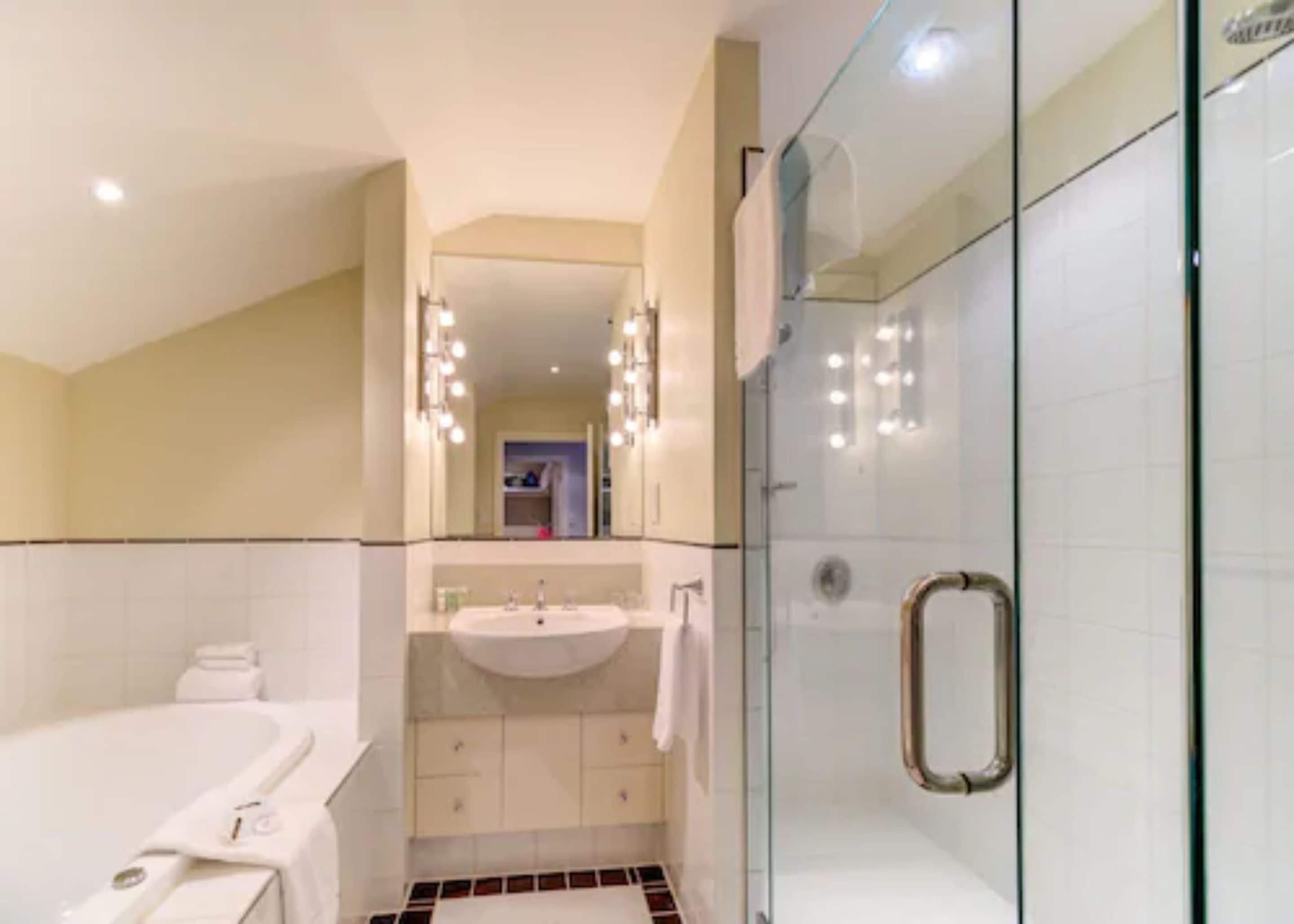 executive suite with spa | bathroom | shower, free toiletries, hair dryer, bathrobes