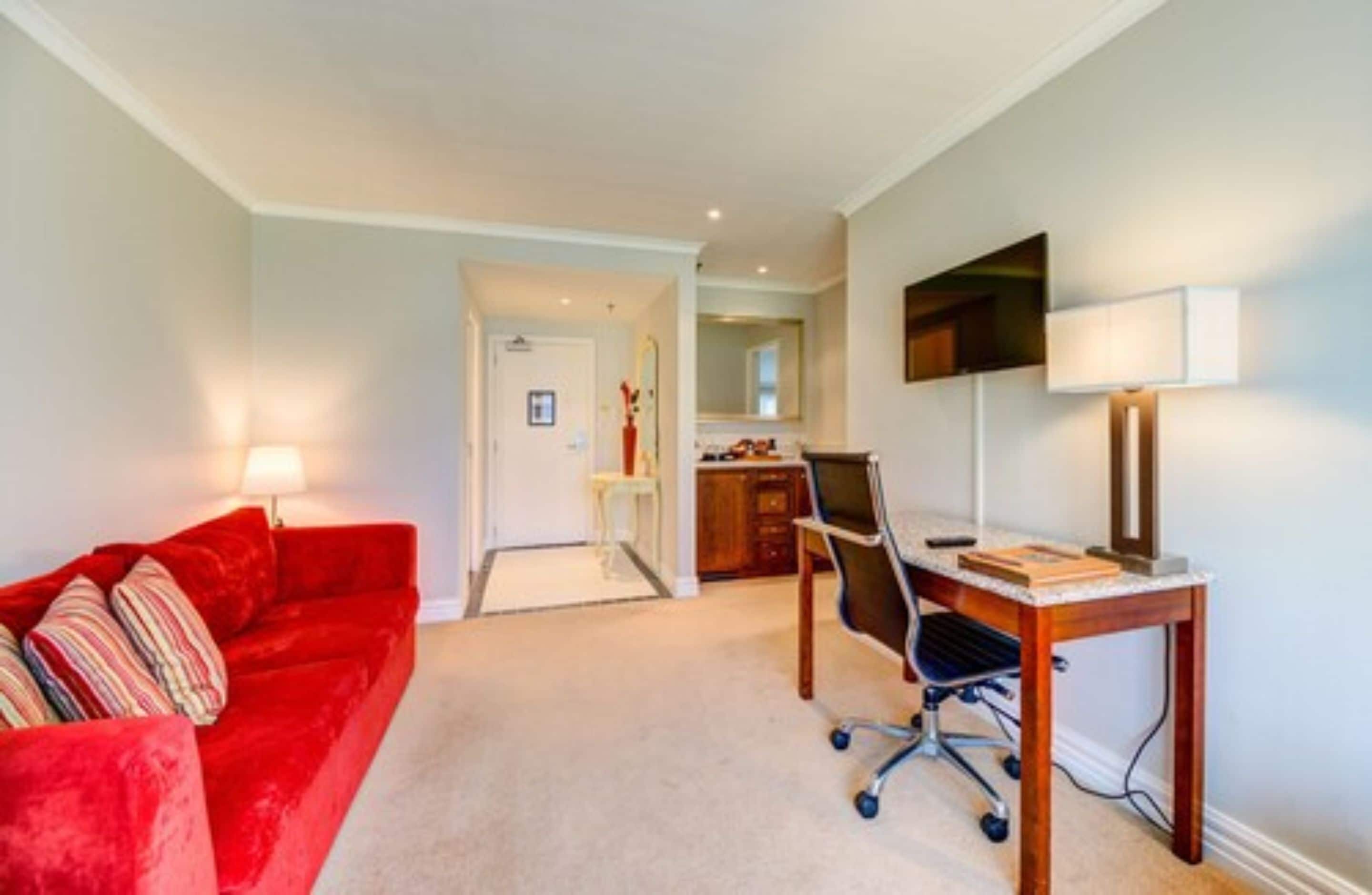 executive suite with spa | living area | 32-inch lcd tv with satellite channels, tv