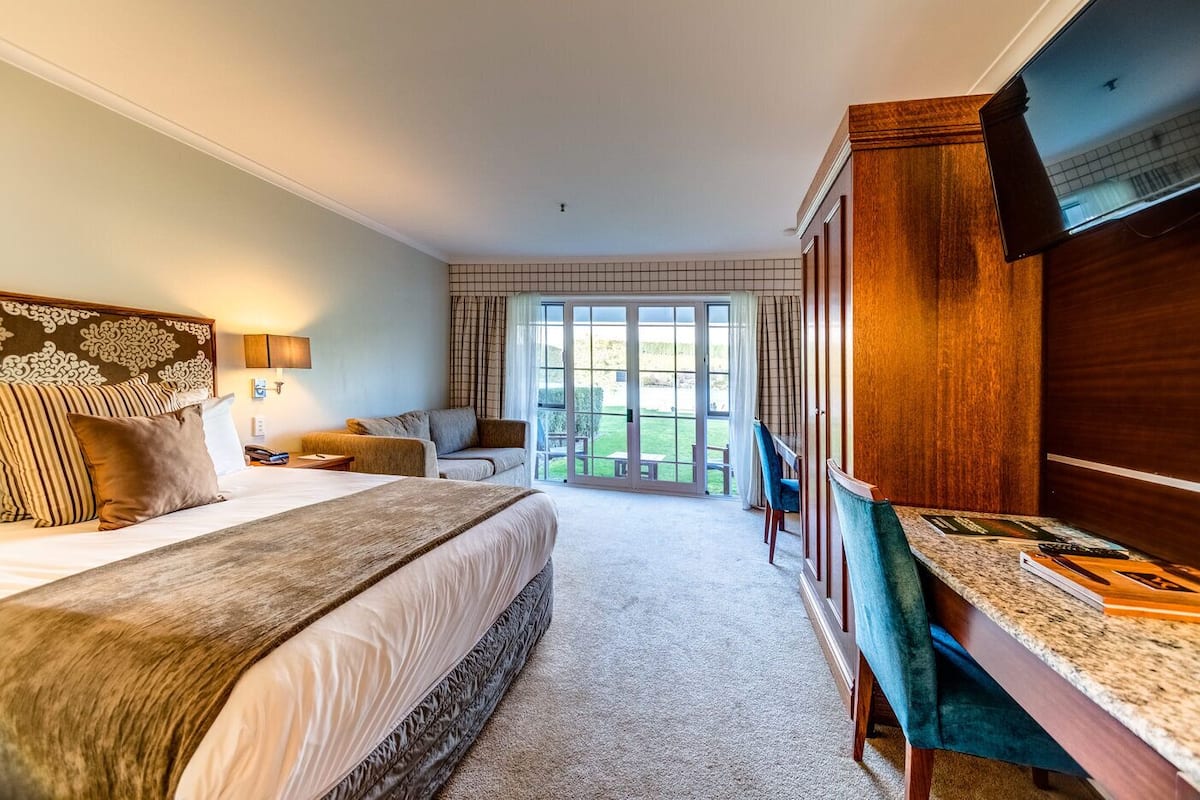 double room | in-room safe, desk, laptop workspace, blackout curtains