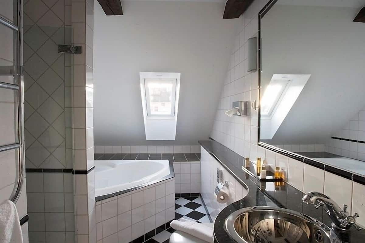 mini suite | bathroom | eco-friendly toiletries, hair dryer, towels