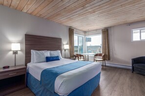 Economy room, 1 Queen bed, No View | Blackout drapes, iron/ironing board, cribs/infant beds, rollaway beds