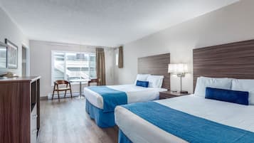 Economy Room, 2 Queen Beds, Non Smoking, No View | Blackout drapes, iron/ironing board, cribs/infant beds, rollaway beds