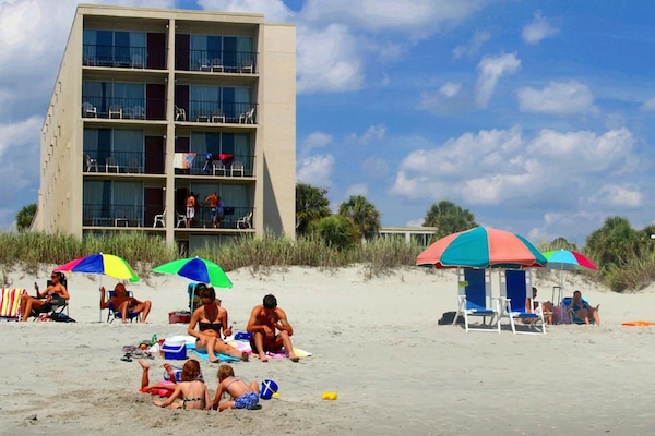 On the beach, white sand