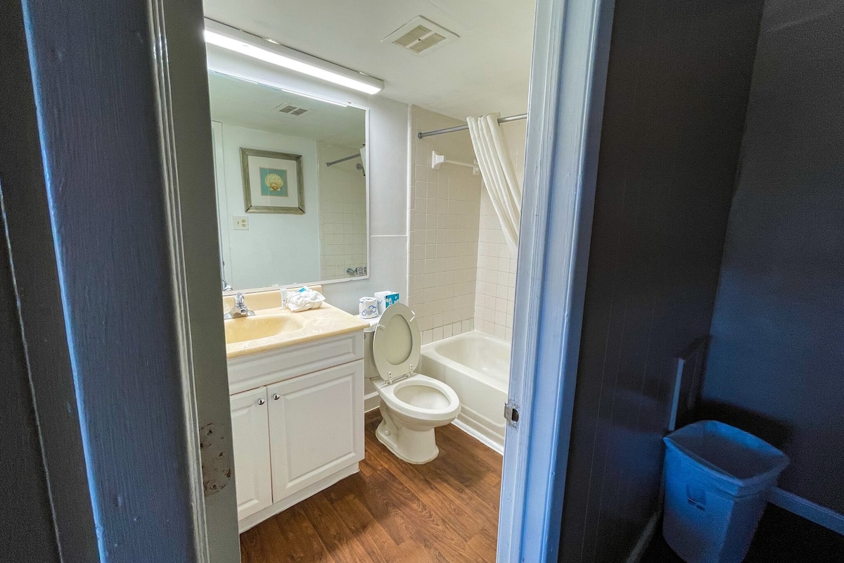 Room, 2 Queen Beds (Side View) | Bathroom | Combined shower/tub, free toiletries, towels