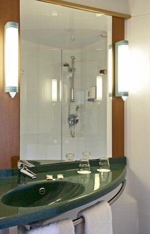 Shower, eco-friendly toiletries, hair dryer, towels