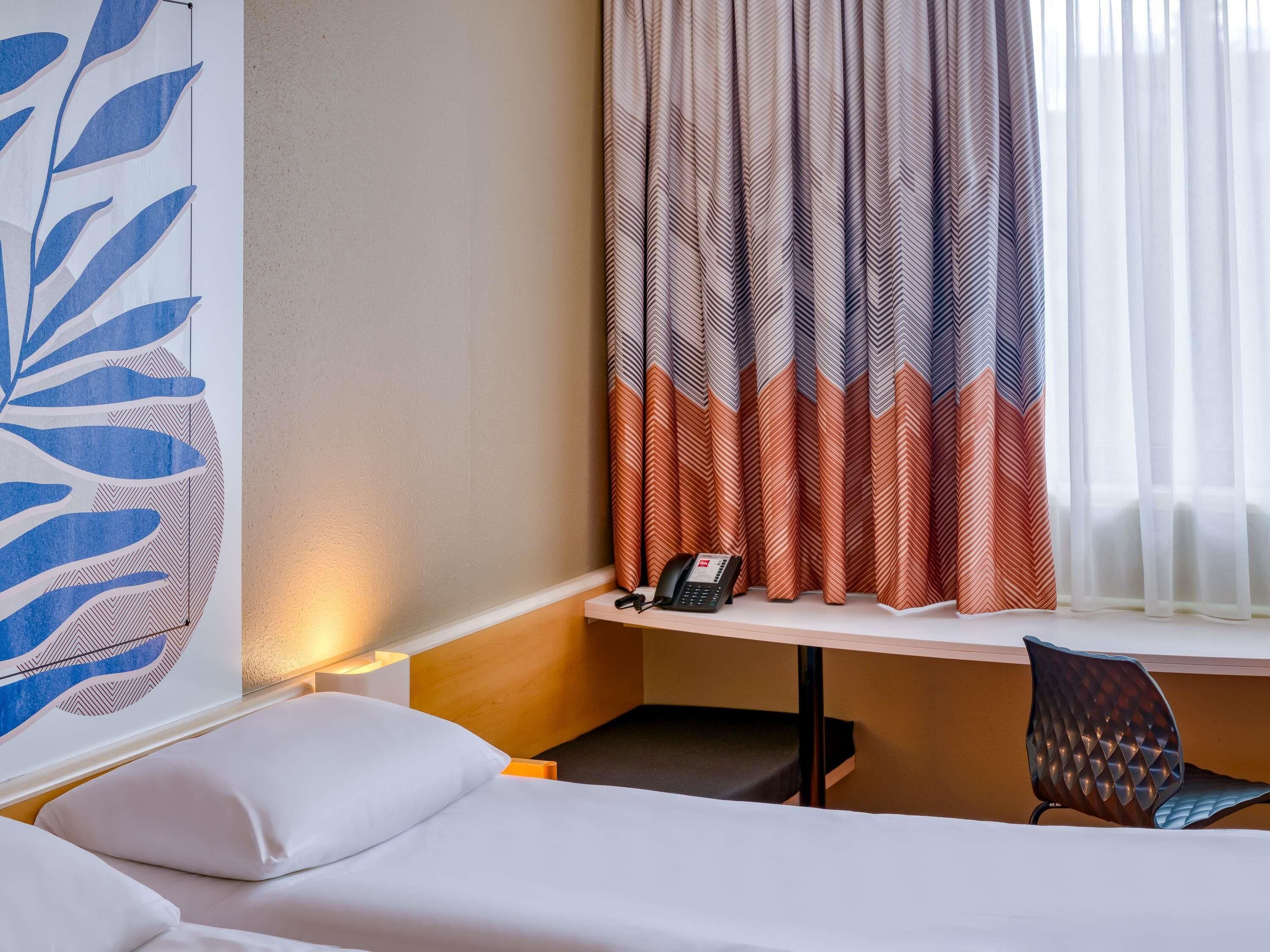 standard room, 2 single beds | hypo-allergenic bedding, desk, blackout curtains, soundproofing