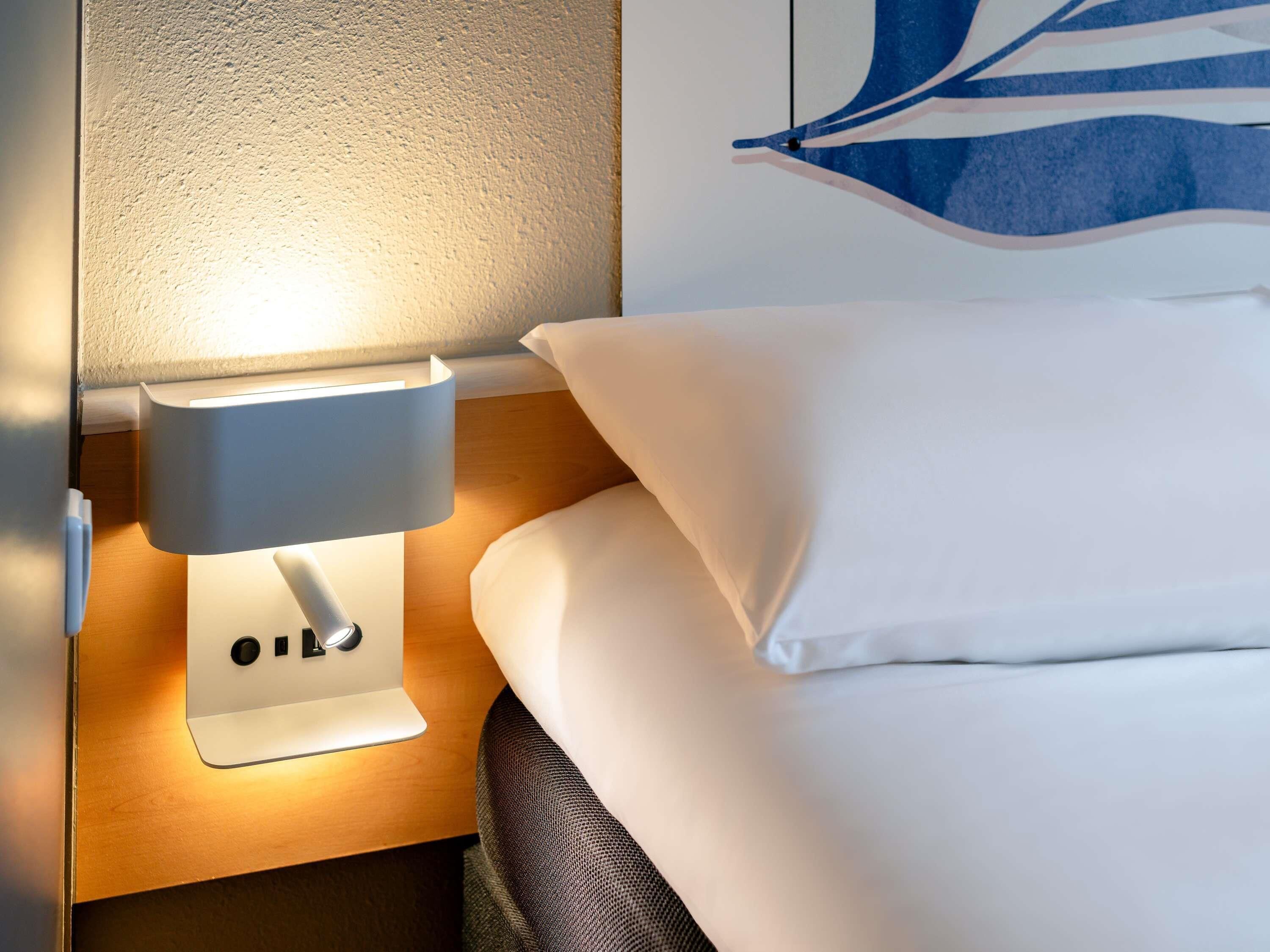 hypo-allergenic bedding, desk, blackout curtains, soundproofing