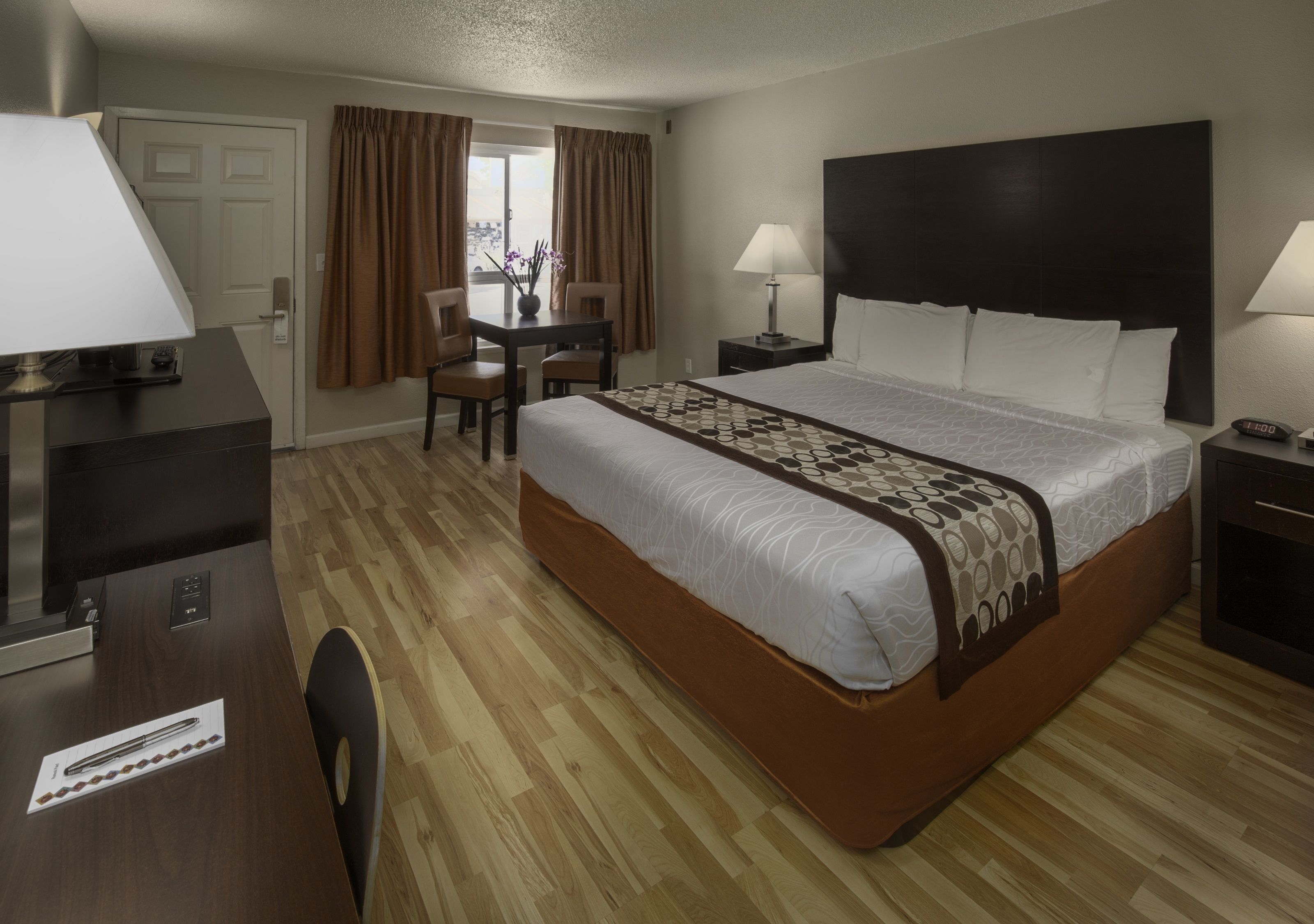 economy room, 1 king bed | desk, laptop workspace, blackout curtains, iron/ironing board