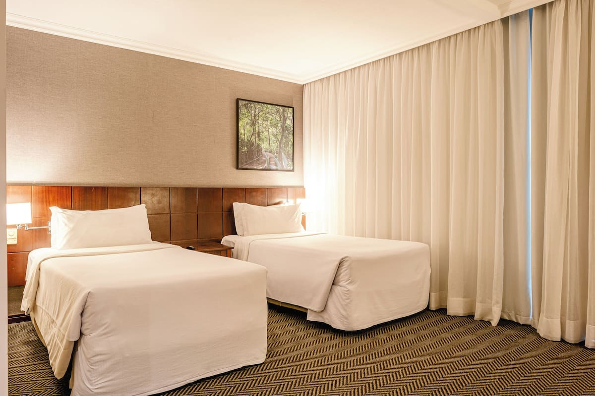 Deluxe Double Room, 2 Single Beds, Balcony | Minibar, in-room safe, desk, blackout curtains
