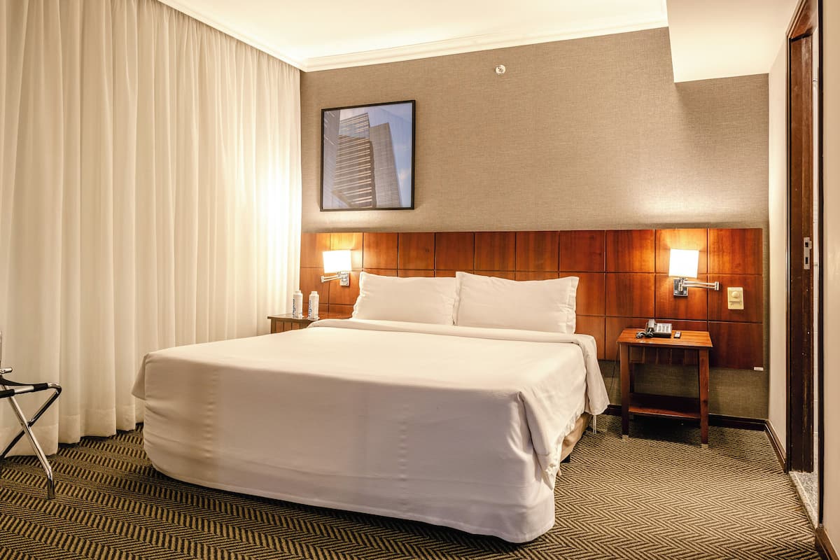 Junior Suite, 1 King Bed | Minibar, in-room safe, desk, blackout curtains