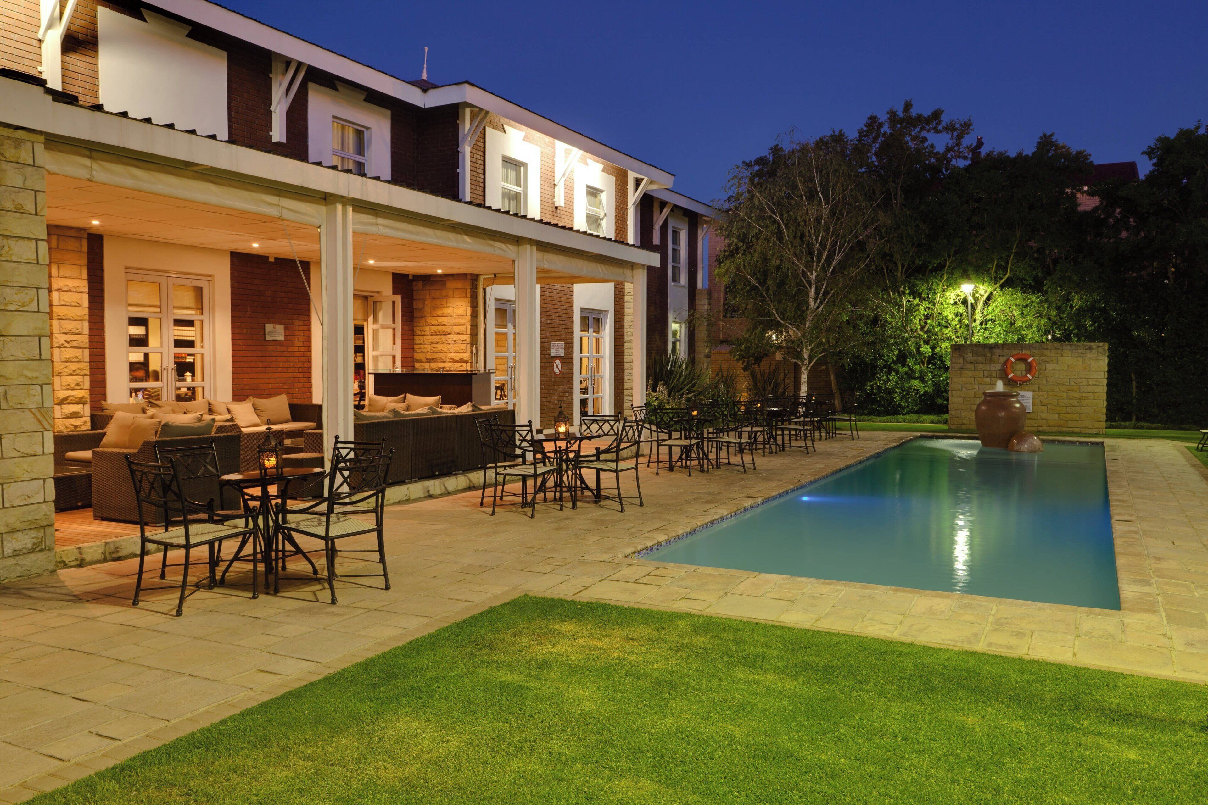 Outdoor pool, pool umbrellas, sun loungers