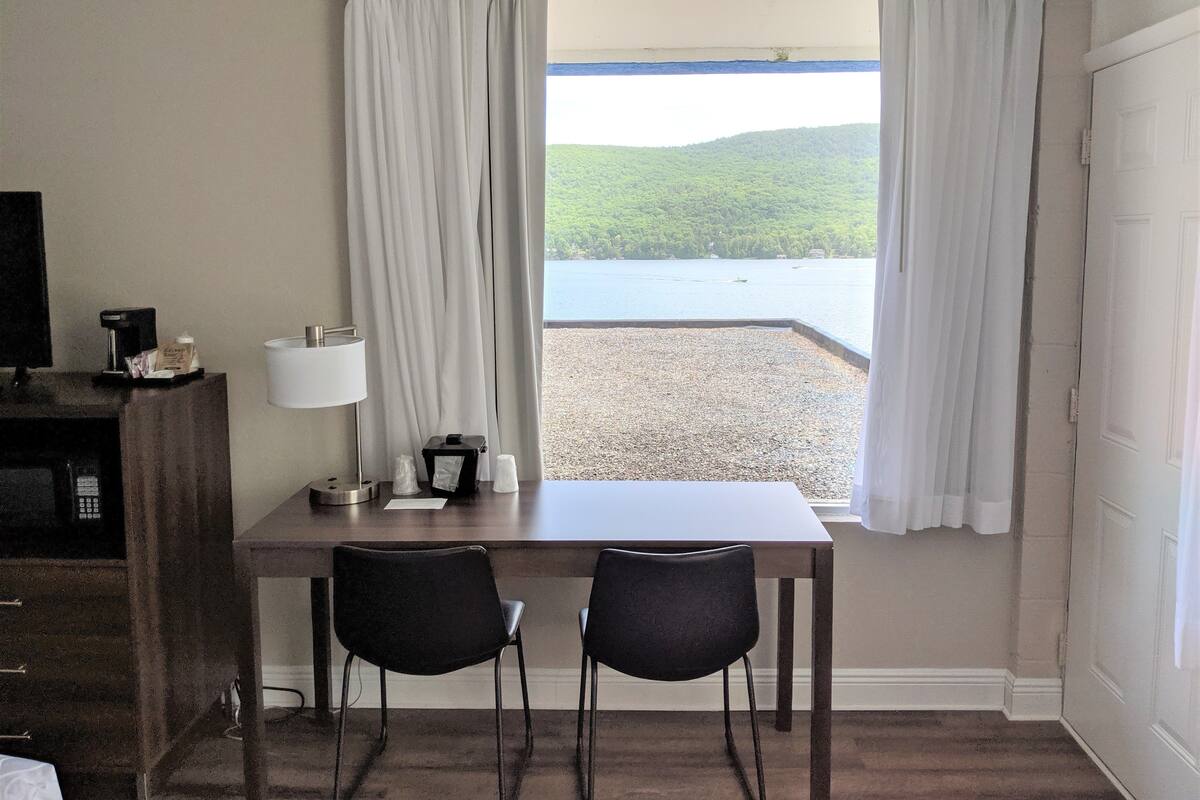 room, 1 king bed, courtyard area | egyptian cotton sheets, premium bedding, blackout curtains