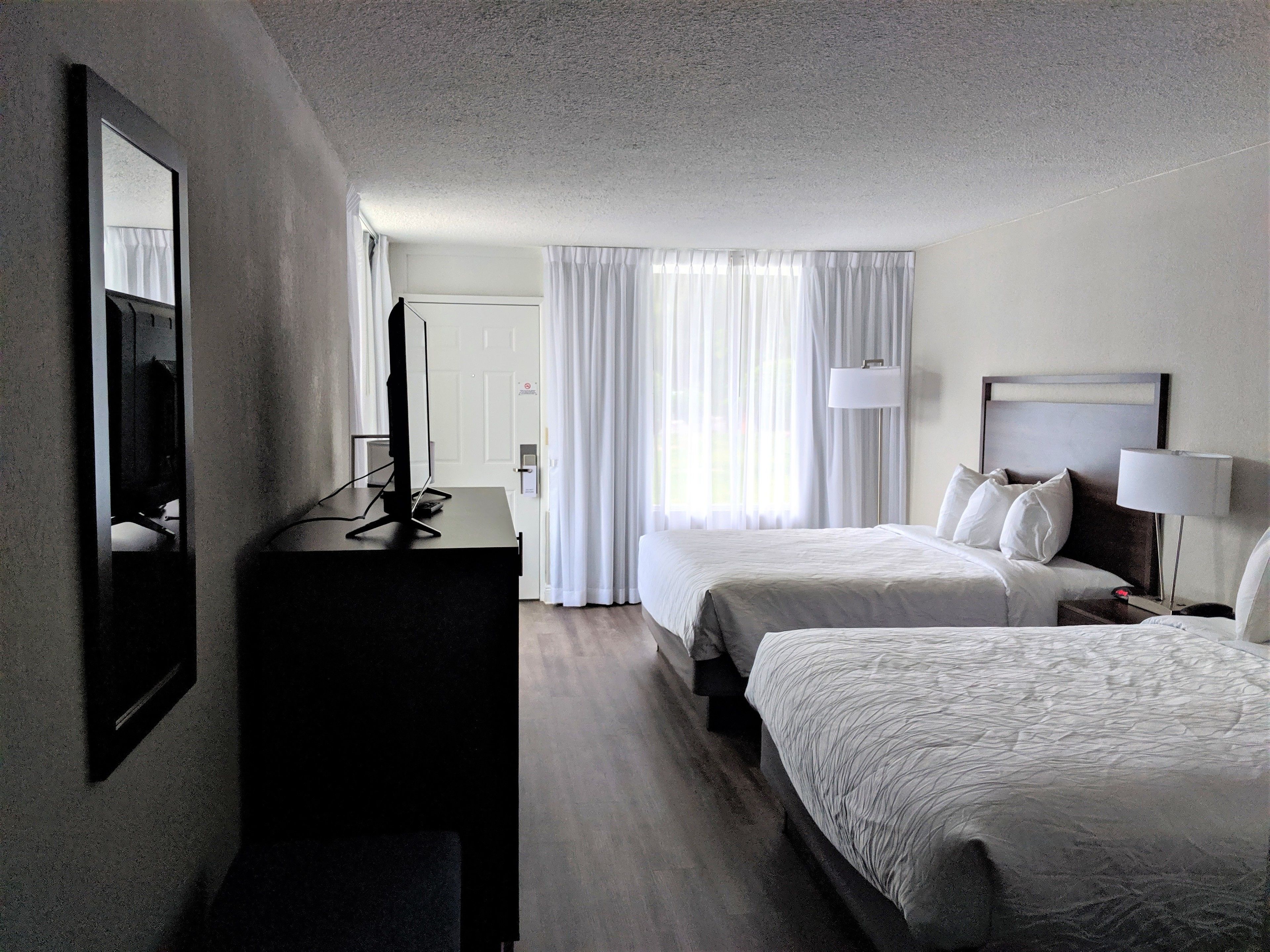 room, 2 queen beds, lake view, beachfront | egyptian cotton sheets, premium bedding, blackout curtains