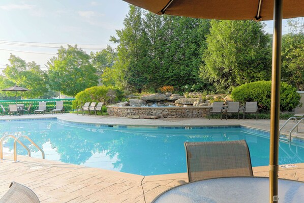 Indoor pool, seasonal outdoor pool, pool umbrellas, pool loungers