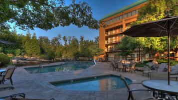 Indoor pool, seasonal outdoor pool, pool umbrellas, pool loungers