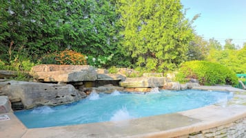 Indoor pool, seasonal outdoor pool, pool umbrellas, pool loungers