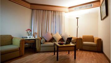 Premier Room, 1 Double or 2 Single Bed | Living area | TV