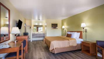 Room, 1 King Bed, Non Smoking | Individually decorated, individually furnished, desk, iron/ironing board