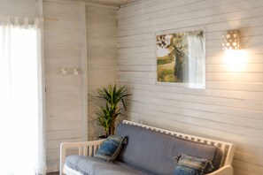 Studio, 1 Queen Bed (Main House) | Living area | Books