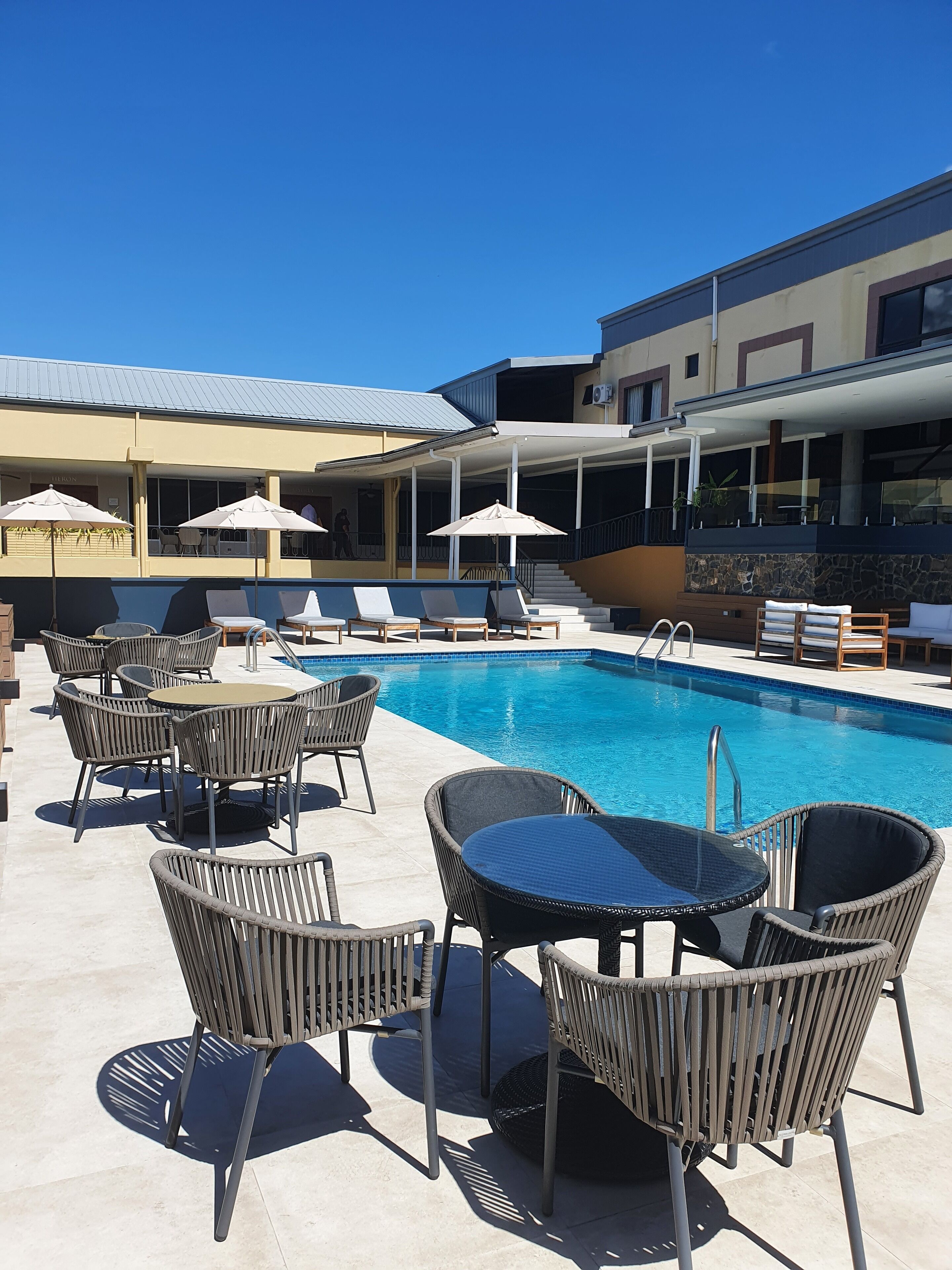 Outdoor pool, pool umbrellas, pool loungers